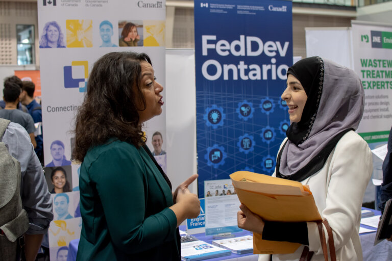 Student and employer in conversation.